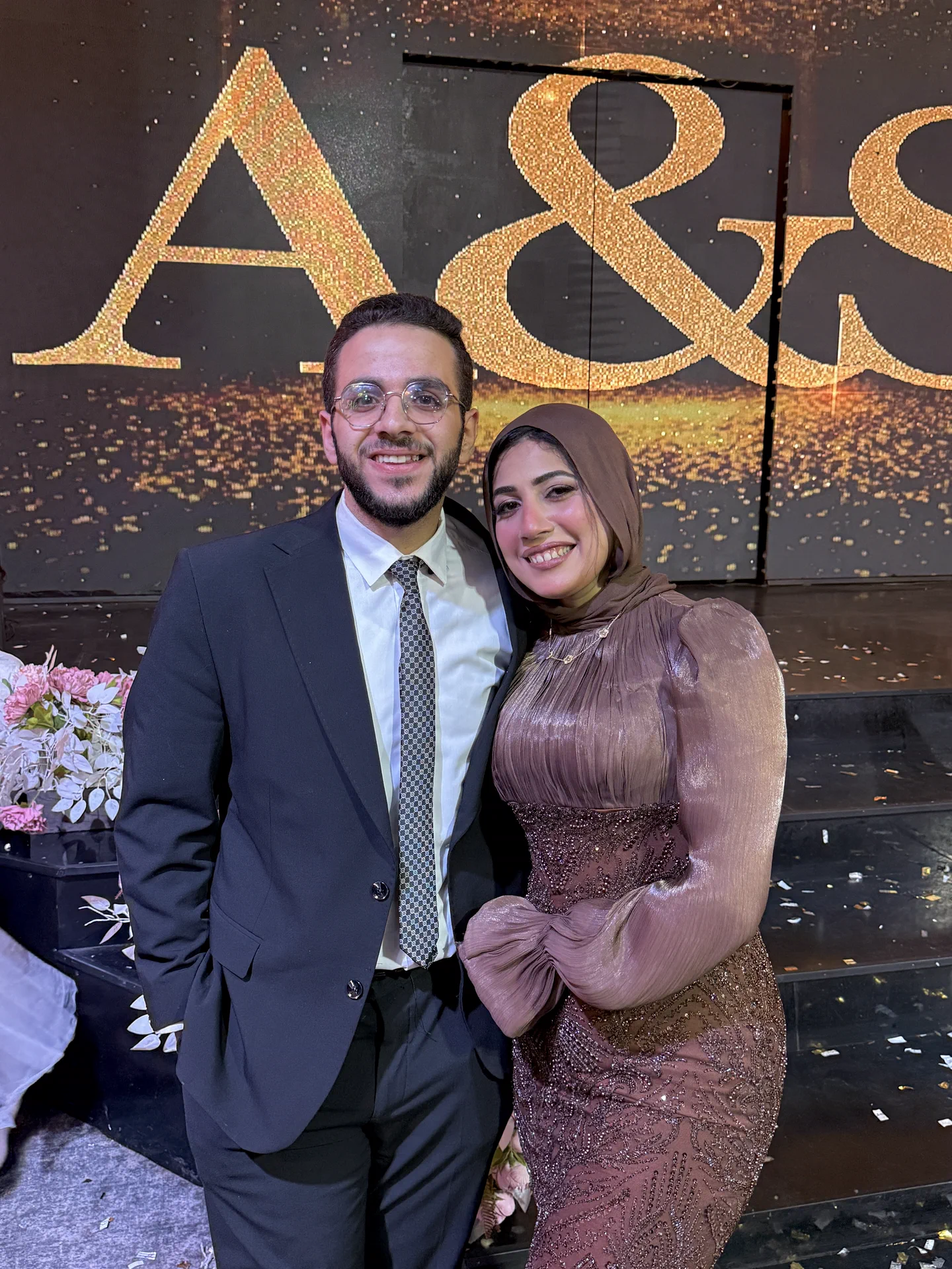 Ahmed and Rawan sharing a quiet wedding moment